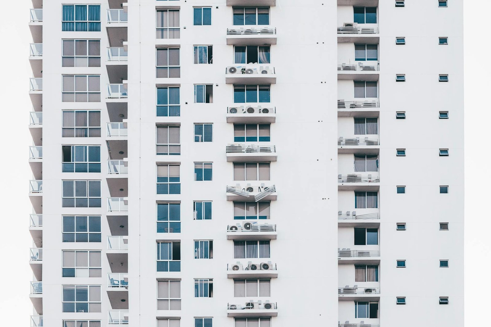 minimalist photography of white and gray condominium